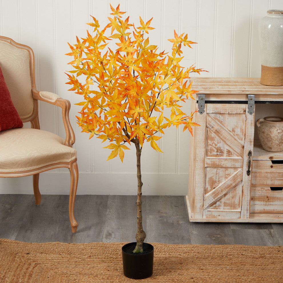 Lifestyle photo in a room with decor; full tree visible