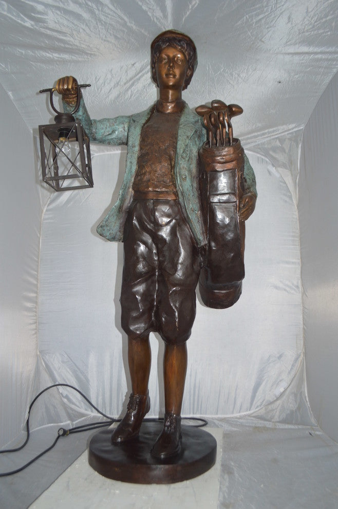 Caddy with light Bronze Statue -  Size: 30"L x 36"W x 64"H.