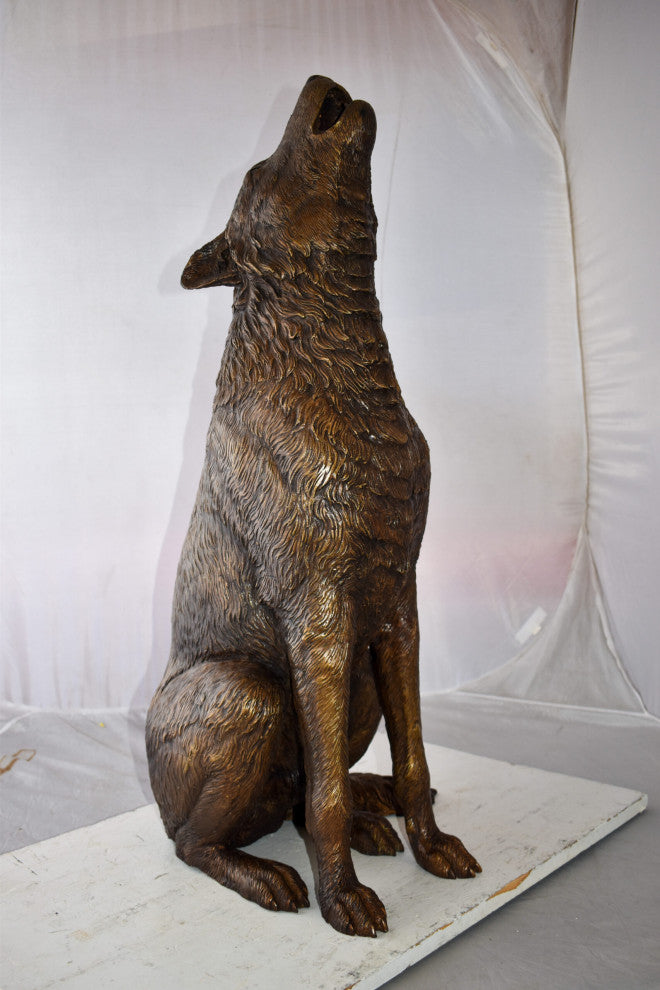 Howling Wolf looking toward the sky Bronze Statue Size: 19" x 19" x 36"H