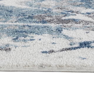 Clifton Abstract Ivory Blue Power-Loom Area Rug 5'3" x 7'6"