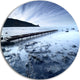 Wooden Pier Deep Into Sea, Seascape Photo Round Metal Wall Art, 11"
