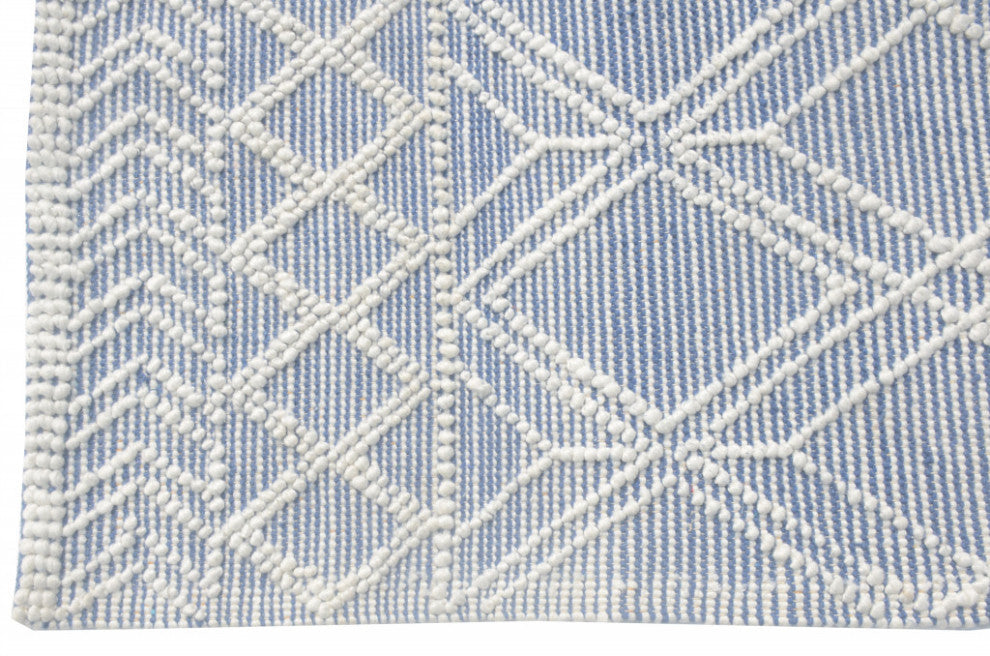 5' X 7' Blue and Ivory Geometric Handmade Area Rug