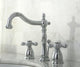 Kingston Brass Widespread Bathroom Faucet With Plastic Pop-Up, Polished Chrome