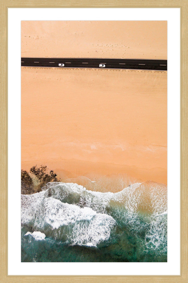 "Driving Along The Beach" Framed Print by Karolis Janulis