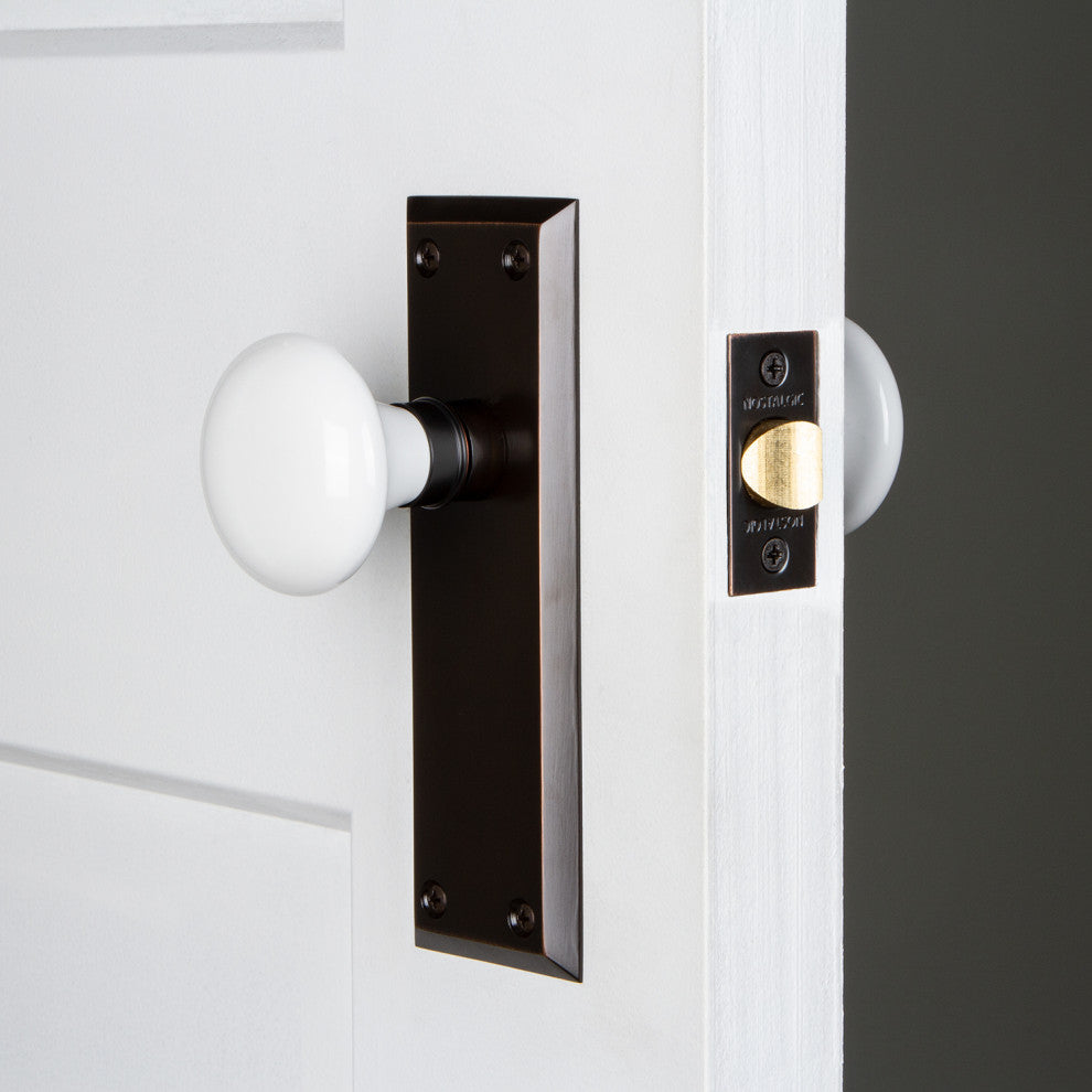 New York Plate Privacy White Porcelain Knob, Timeless Bronze