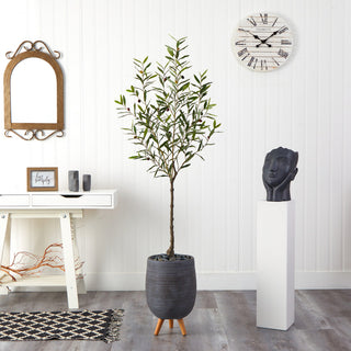 Lifestyle setting showing the tree in a room with decor.