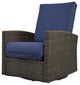 Del Mar Wicker Swivel Recliner, Brown and Navy with Sunbrella