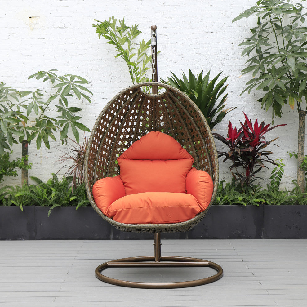 LeisureMod Beige Wicker Hanging Egg Swing Chair With Stand and Cushion, Orange