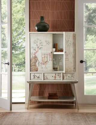 Lifestyle image showing the cabinet in a room, doors/contents visible.