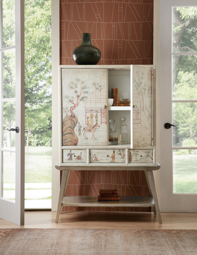 Lifestyle image showing the cabinet in a room, doors/contents visible.