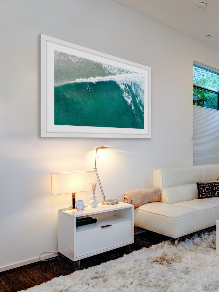 "Riding The Wave" Framed Print by Karolis Janulis