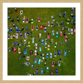 "People On Towels" Framed Print by Karolis Janulis