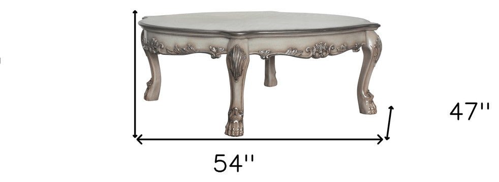 54" Bone Solid And Manufactured Wood Coffee Table