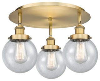 Beacon-3 Light 18" Flush Mount-Brushed Brass, Seedy Glass Shade