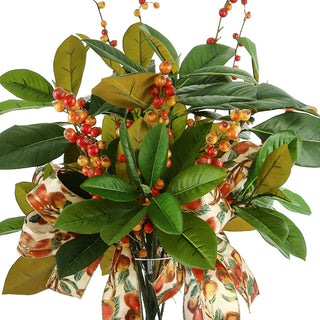 Magnolia Leaf and Berry Holiday Arrangement with Fruit Bows