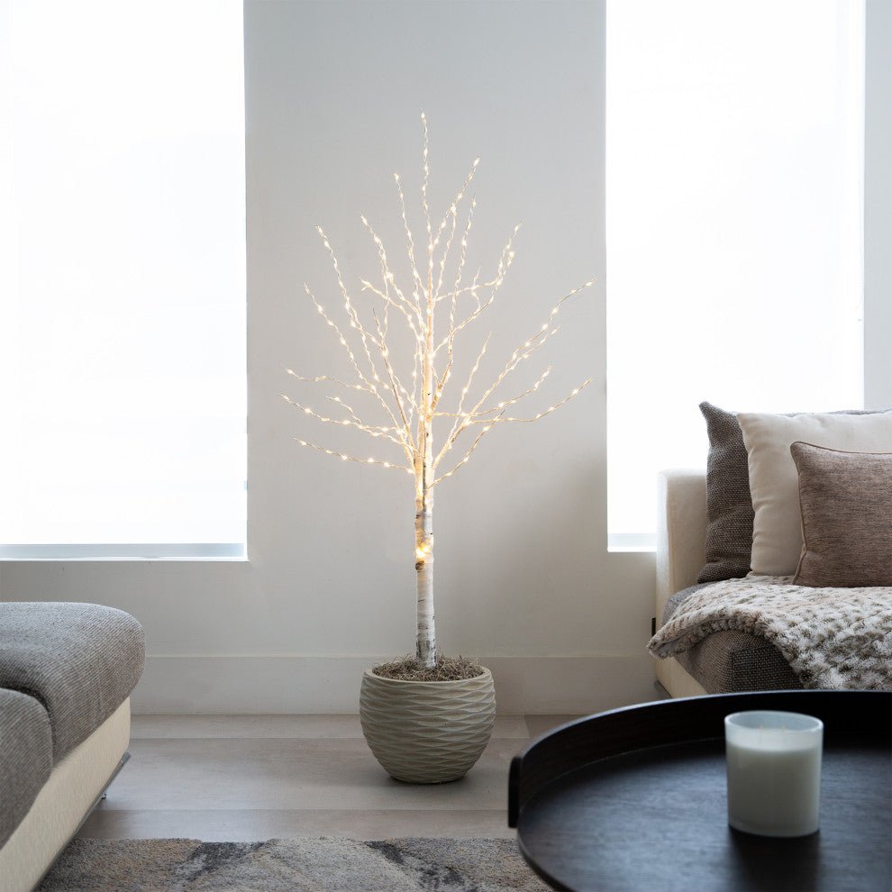 Another lifestyle shot showing the tree placed in a room context.