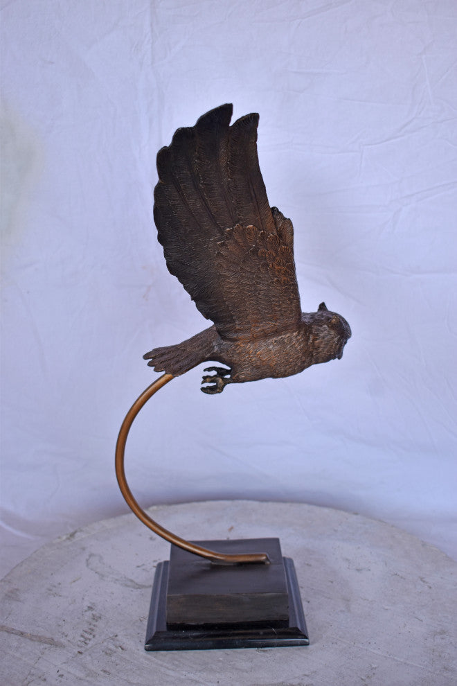 Owl Searching for Prey Bronze Statue Size: 18"L x 11"W x 22"H.