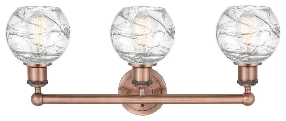 Athens Deco Swirl 3-Light 24" Bath Vanity Light, Antique Copper, Clear
