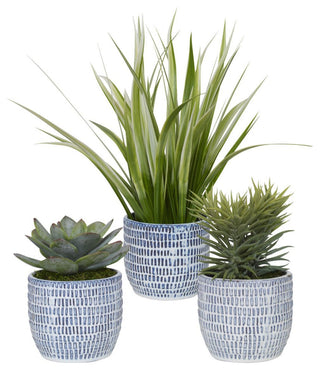 Full product image on a solid white background showing the complete Puebla greenery, blue-and-white pots set.