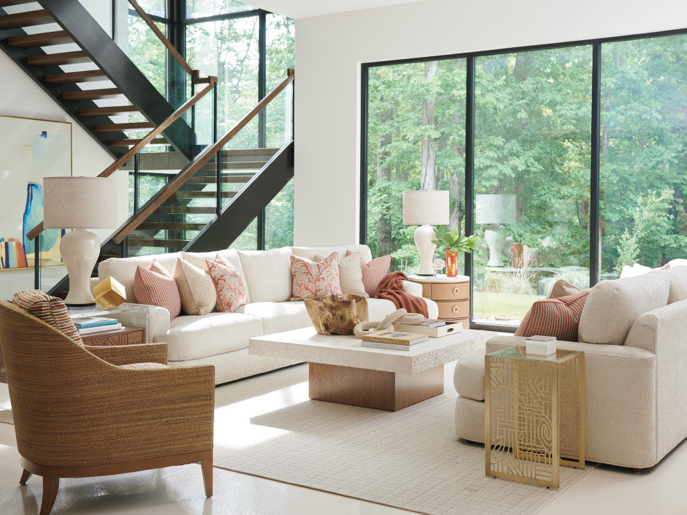 Lifestyle shot in a real living room environment; shows the table in-use with surrounding furniture.