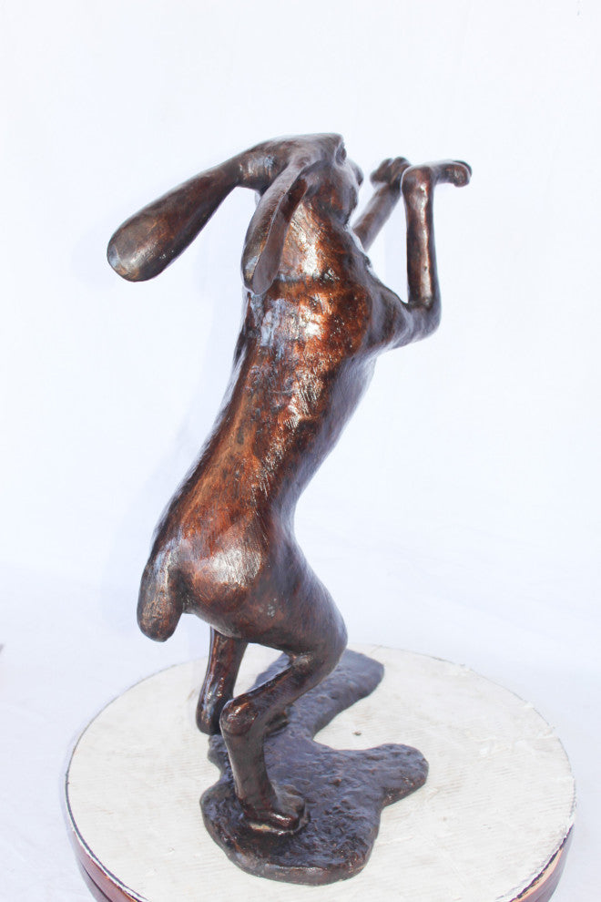 Leaping jackrabbit bronze statue -  Size: 21"L x 13"W x 24"H.