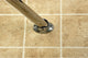 Kingston Brass Adjustable Single Curved Shower Curtain Rod, Polished Chrome