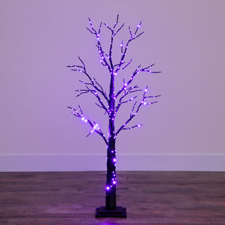 Full tree shown in a real environment with lit branches (lifestyle full).
