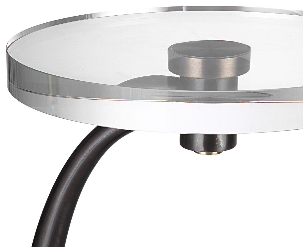 Close-up of the glass top and mounting against white background.