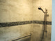 Premium natural stone, eco-friendly mesh backing, charcoal pebble border