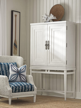Product shown in a real room setting with furnishings; full cabinet visible; lifestyle context.