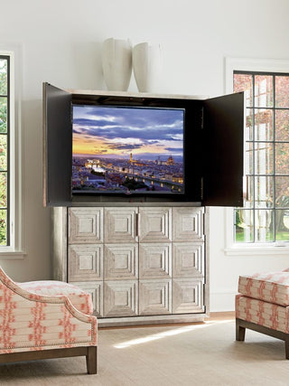 Lifestyle image showing the cabinet in use as a media/TV console in a living room.