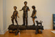 Three Kids With A Dog On A Log Bronze Statue