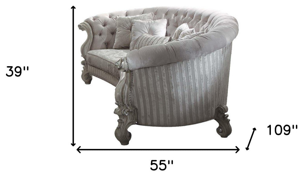 55" Ivory Velvet Curved Floral Sofa And Toss Pillows With Gray Legs