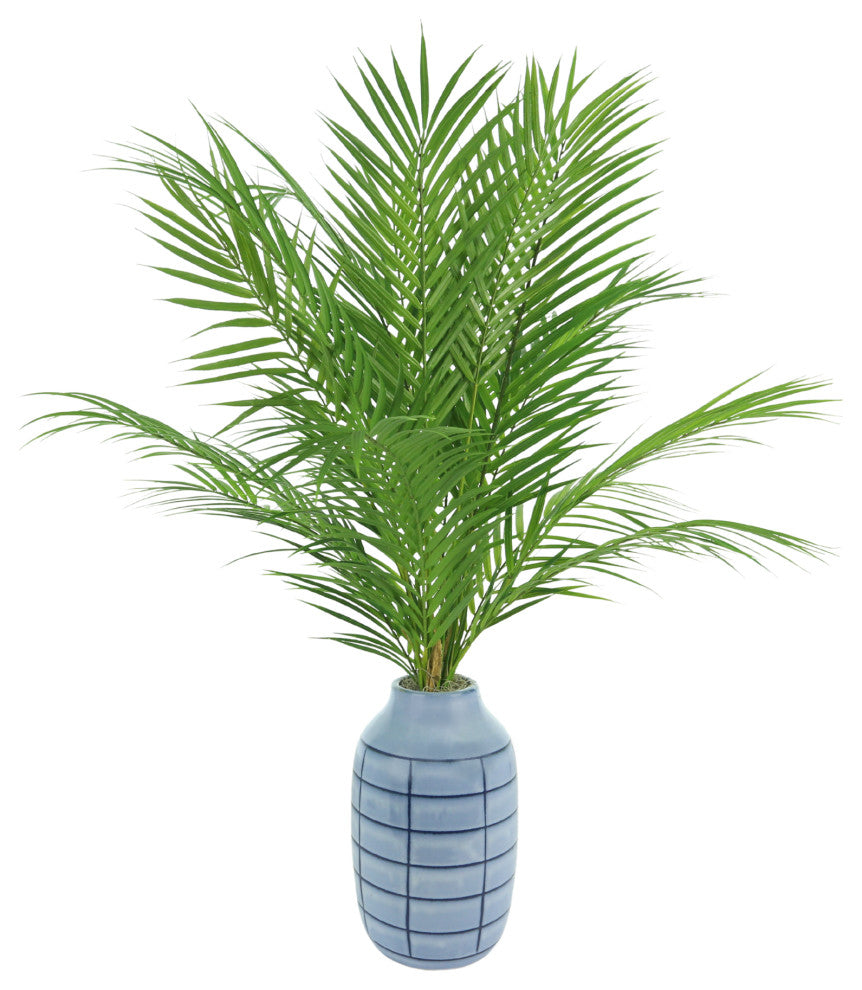 Palm Leaves in a blue ceramic vase