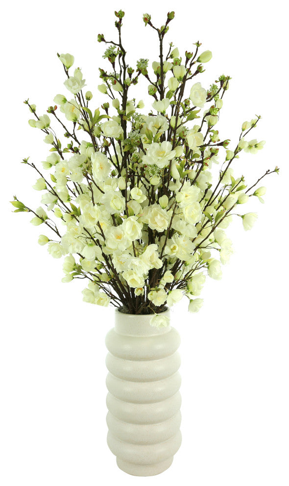 Cherry Blossoms Arranged in Ridged Ceramic Vase