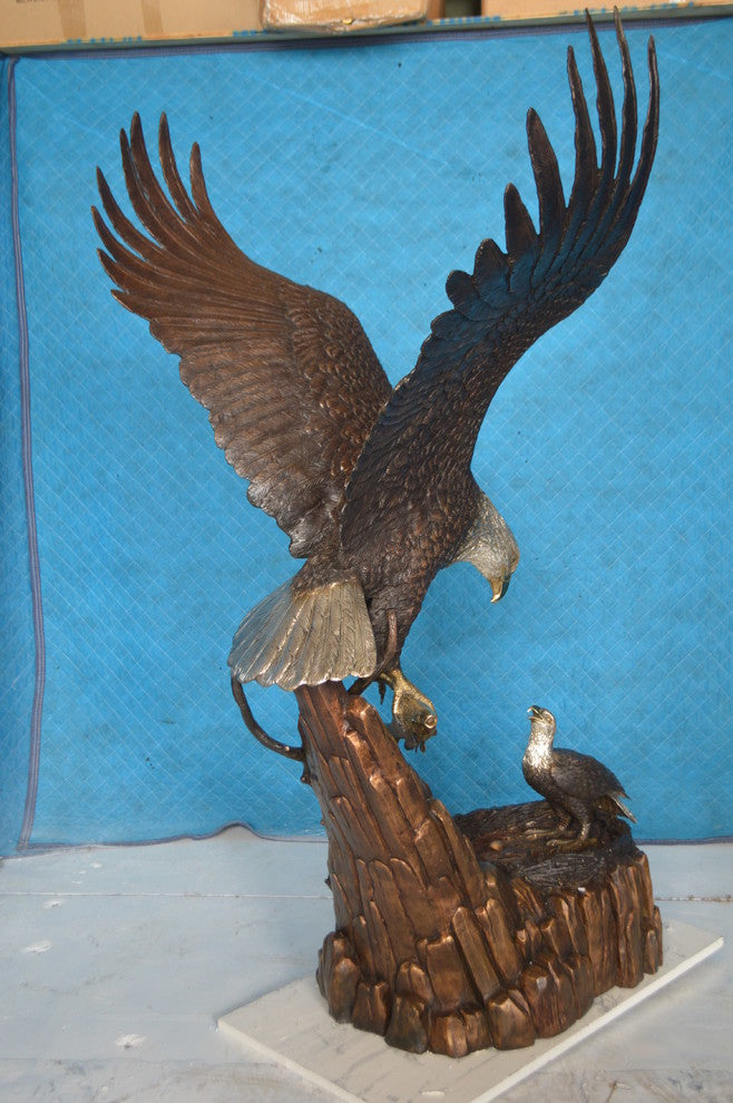 Eagle with nest Bronze Statue -  Size: 36"L x 40"W x 63"H.