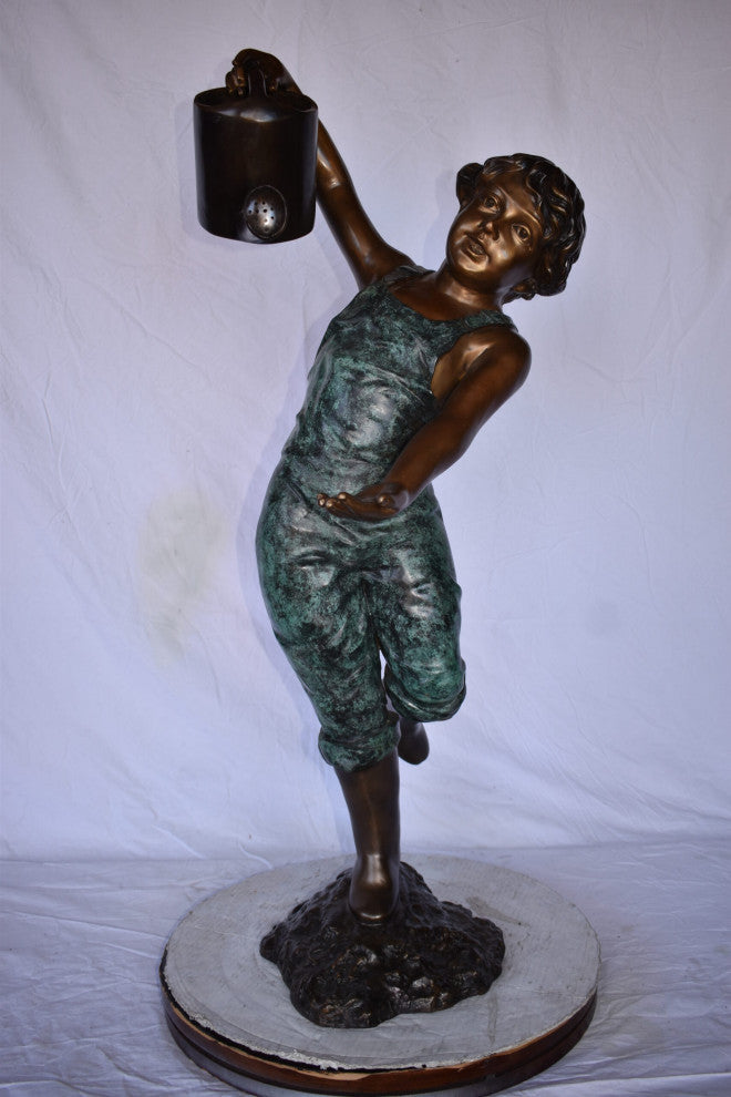Standing Boy With Watering Can Bronze Statue Size: 15"L x 15"W x 39"H.