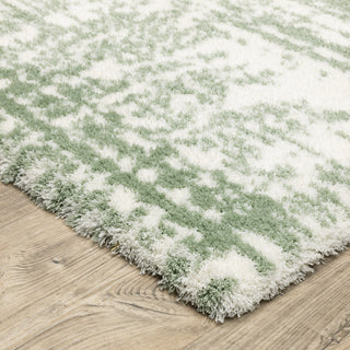 Greer Modern Distressed Etchings Green/ Ivory Area Rug, 3'10" x 5'5"