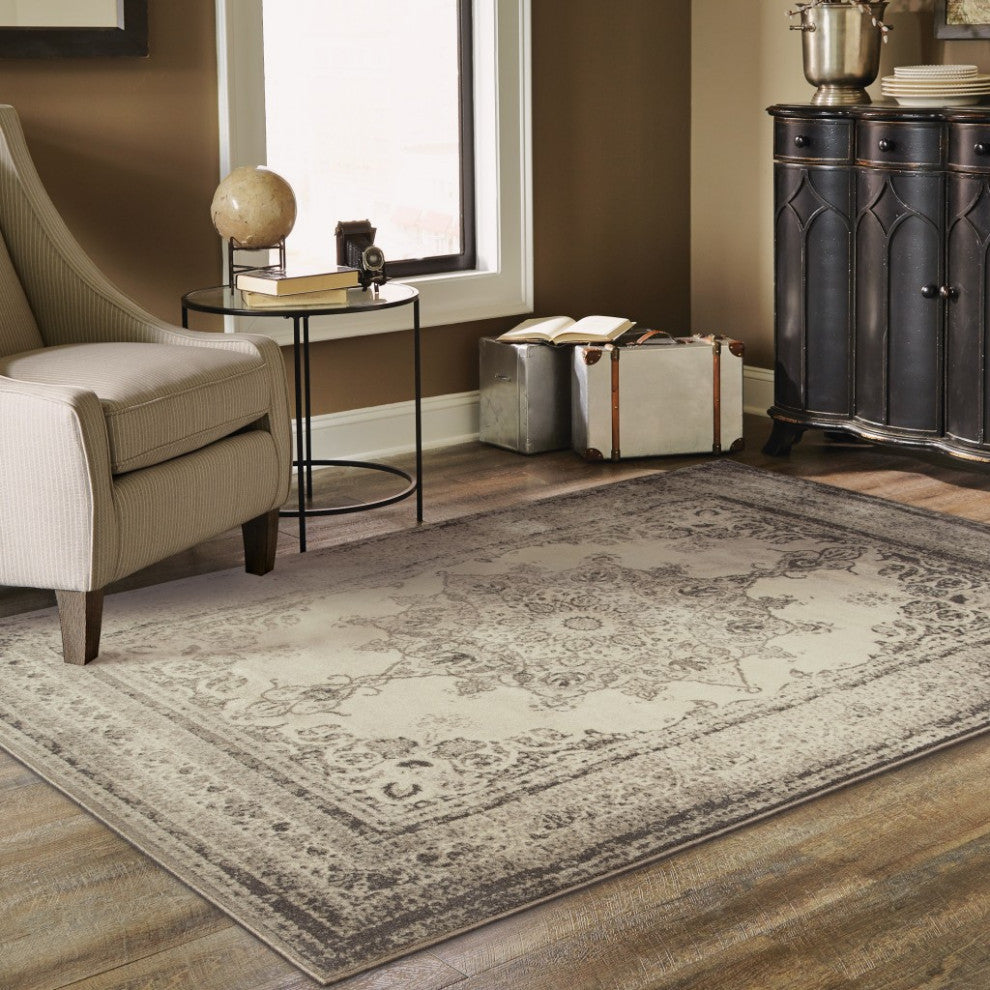7"x10" Ivory and Gray Pale Medallion Area Rug