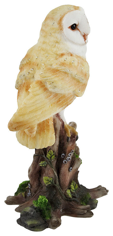 Barn Owl Vigilantly Perched on Tree Stump Statue