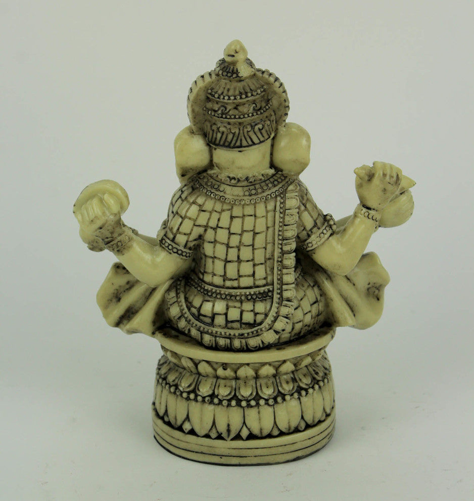Lord Ganesha Sitting On Lotus Flower Holding Sacred Objects Statue