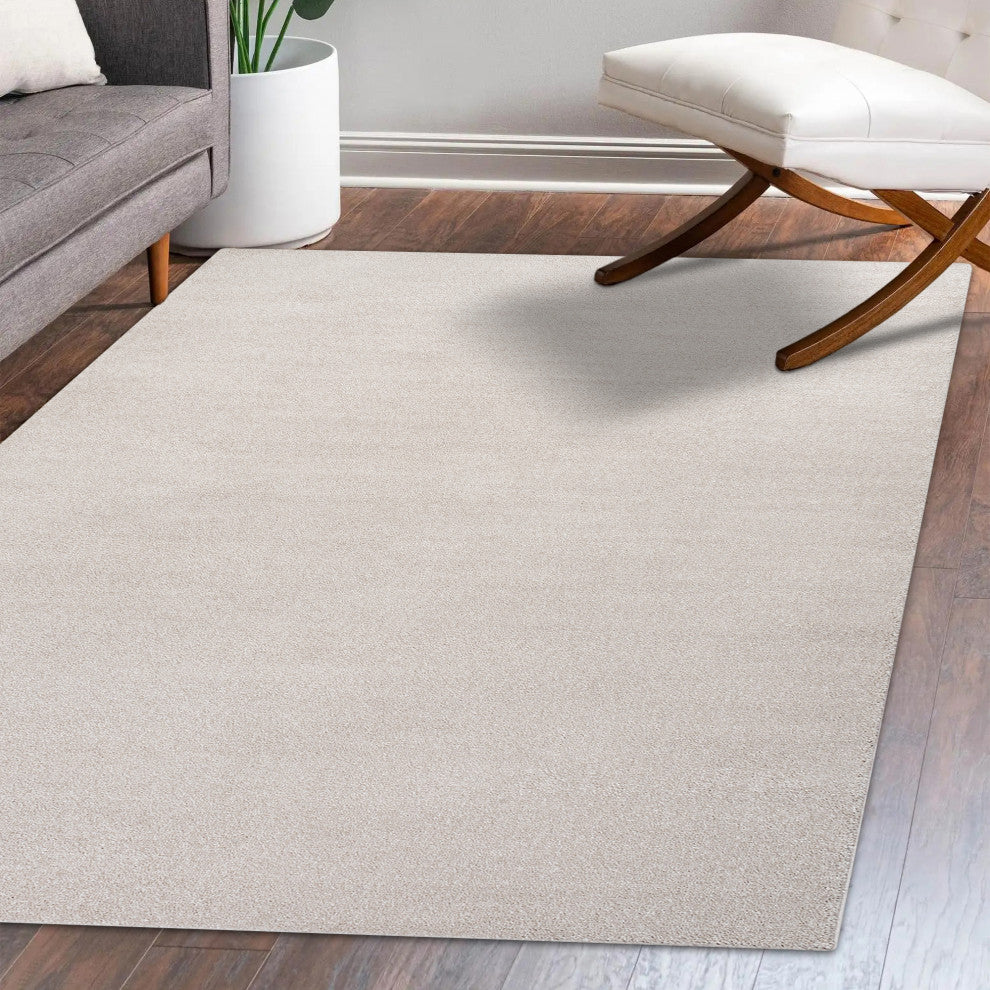 Haze Solid Low-Pile Ivory 12 ft. x 15 ft. Area Rug