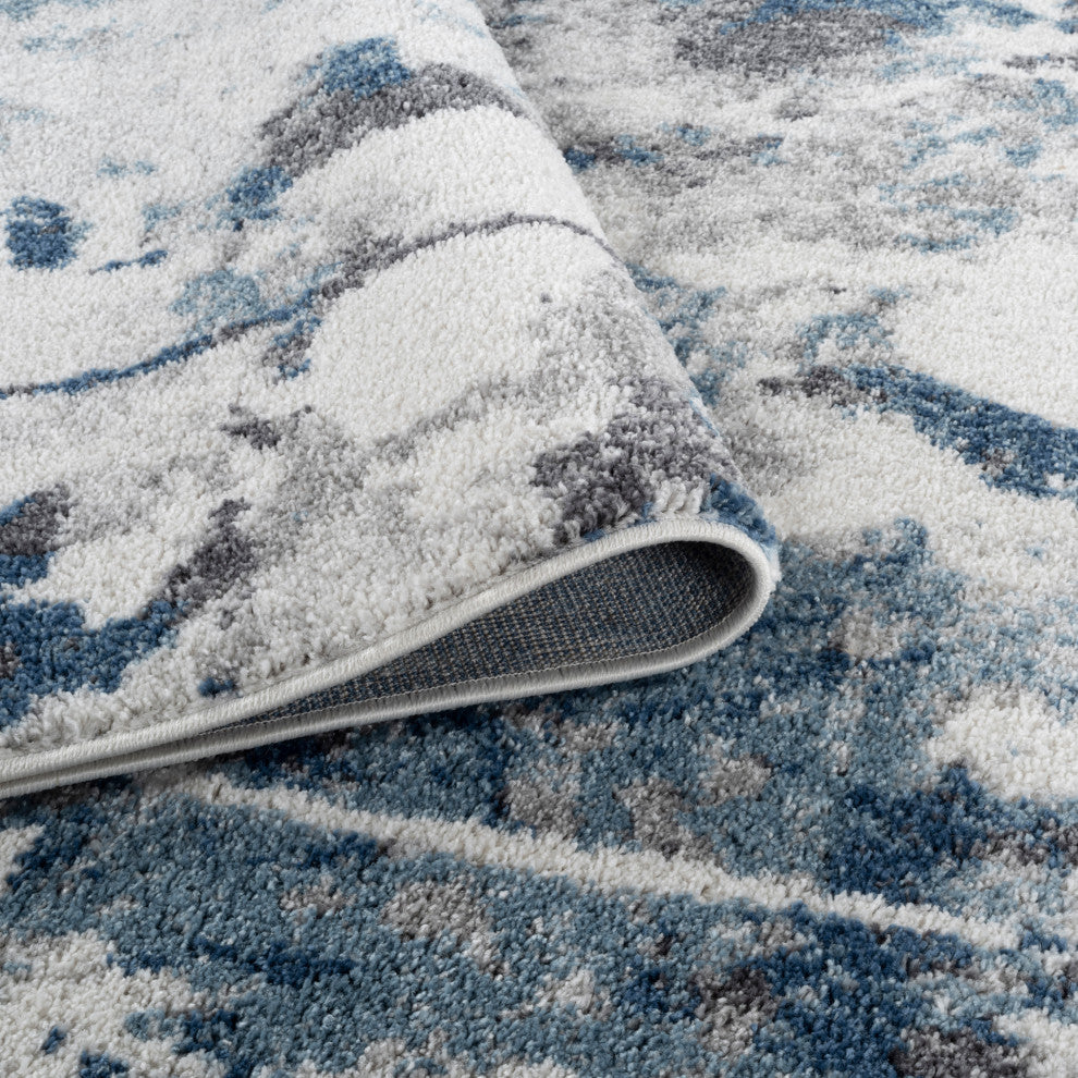 Clifton Abstract Ivory Blue Power-Loom Area Rug 5'3" x 7'6"