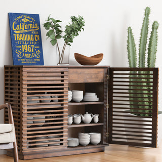 Lifestyle photo: cabinet shown in a real dining/room environment.