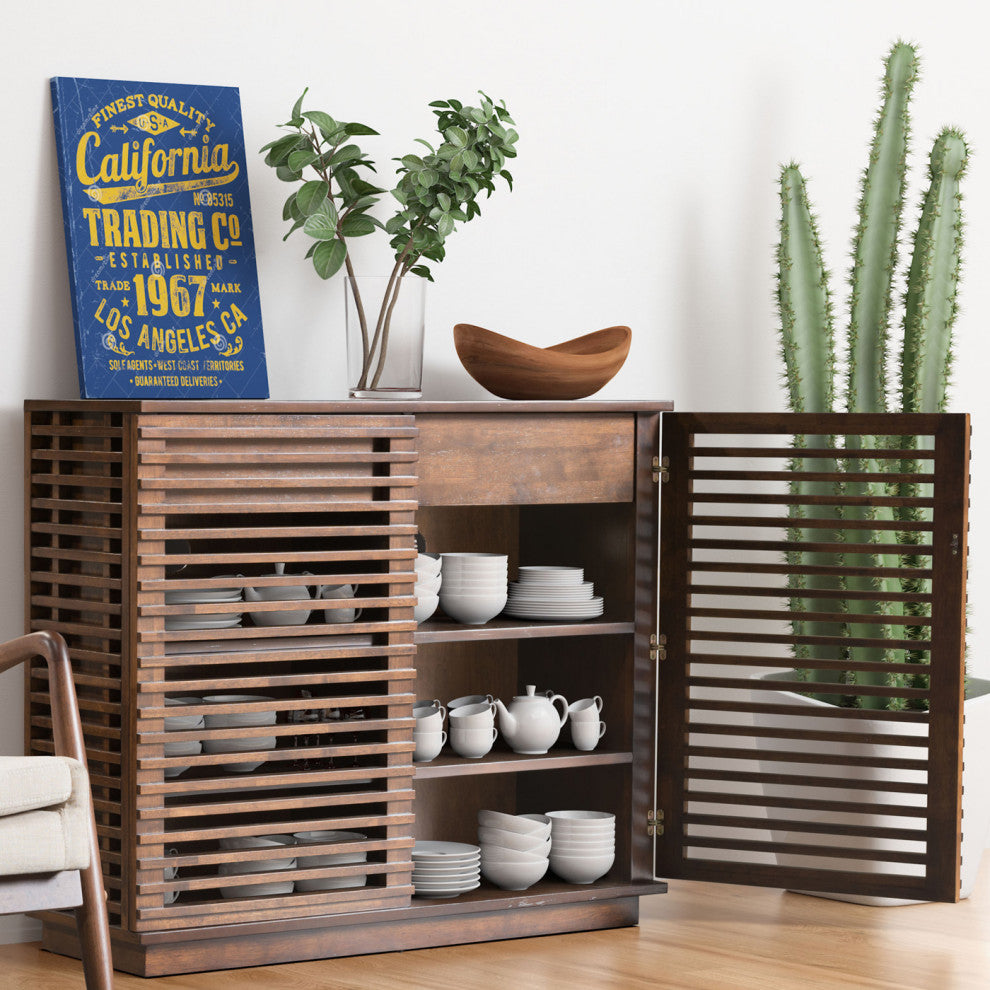 Lifestyle photo: cabinet shown in a real dining/room environment.
