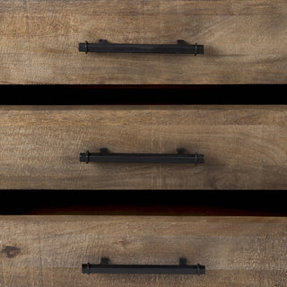 Close-up of drawer handle and wood texture on white background.