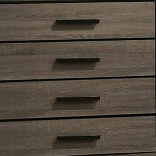Close-up of drawer handles on white background.