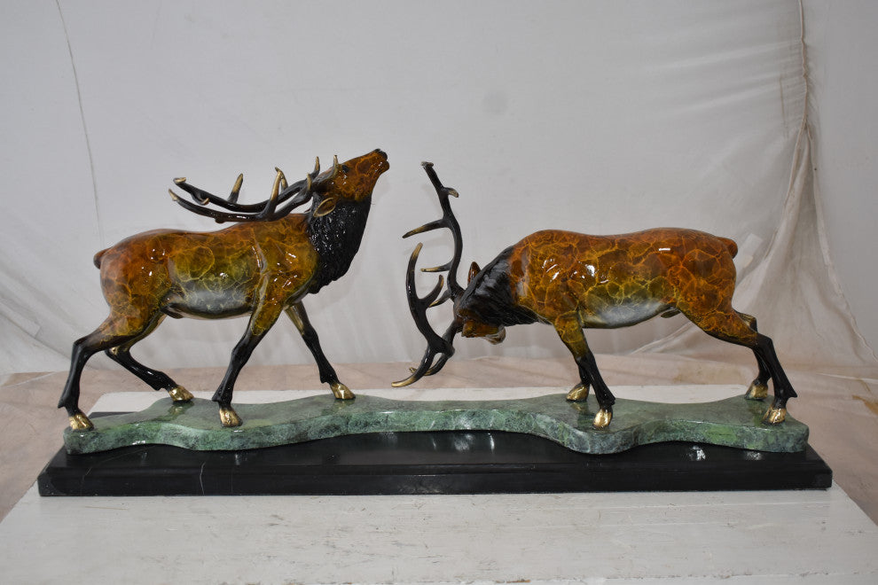 Fighting Deer Bronze Statue Mounted on a Marble Base Size: 32" x 8" x 14"H