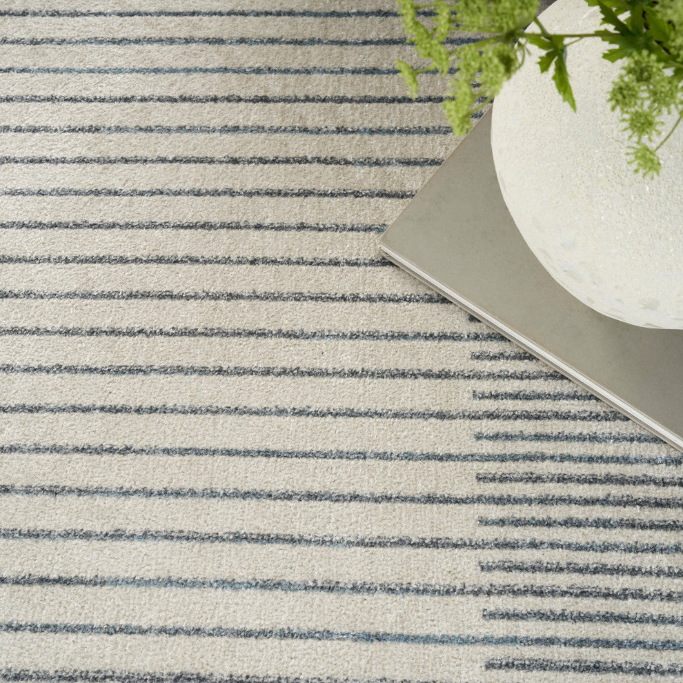 Nourison Astra Machine Washable 7' x 9' Ivory Blue   Area Rug