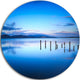 Jetty Remains In Blue Sea, Seascape Photo Round Wall Art, 23"